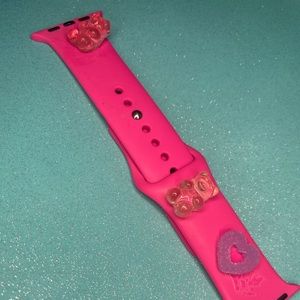 Pink customized Apple Watch candy themed bands .